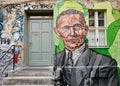 Closeup of a door with barack obama graffiti, restaurant, Berlin