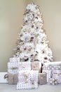 Closeup of Dreamy white Christmas Tree decorated in Blush Pink Ornments