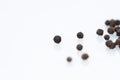 Closeup dried black pepper on white background