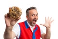 Closeup of dried figs held by surprised employee