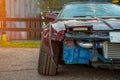 Closeup of a drift car. Seriously prepared and tuned sports car. LED headlights, radiator, bumper removed. Established negative