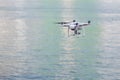 Closeup on drone flying over river background