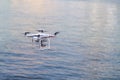 Closeup on drone flying over river background