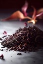 Closeup of dry black tea on dark background. AI generated Royalty Free Stock Photo