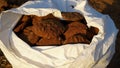 Cow cakes closeup. Beautiful round Cow chips holding in sunlight to dry. Handmade cow chips for domestic fuel use Royalty Free Stock Photo