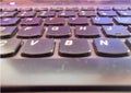 Closeup of dusty laptop computer keyboard