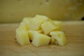 Closeup of Dutch cheese cubes with holes Royalty Free Stock Photo