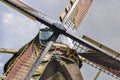 Closeup of a Dutch windmill, center connecting four wings Royalty Free Stock Photo