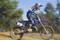 Closeup dynamic shot of motocross racer