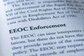 closeup of the EEOC enforcement of the Government, printed in textbook on white page.