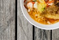 Closeup egg noodle soup with roasted pork and fried wanton, Royalty Free Stock Photo