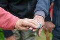 Closeup of elderly couple holding hands. Husband and wife holding hands and comforting each other. Love and care concept Royalty Free Stock Photo