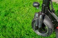 Closeup electric scooter on the grass