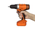 Closeup of electric screwdriver on white. orange drill in the man's hands is isolated on white. tightening the screws. screw gun Royalty Free Stock Photo