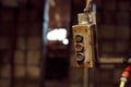 Closeup of an electrical cabinet in the barn with walls blurred background