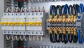 Closeup of electrical distribution board with circuit breakers and wires Royalty Free Stock Photo