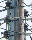 Closeup of electrical wires and connections on a utility pole