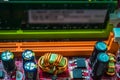 Closeup on electronic board in hardware repair shop, blurred and toned