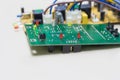 Closeup on electronic board power supply,blurred and toned image Royalty Free Stock Photo