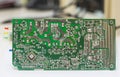 Closeup on electronic board power supply,blurred and toned image Royalty Free Stock Photo