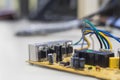 Closeup on electronic board power supply,blurred and toned image Royalty Free Stock Photo