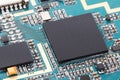 Closeup of electronic chip computer on circuit board with processor cpu background Royalty Free Stock Photo