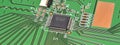 Closeup on electronic circuit board with components and semiconductors. long banner web image Royalty Free Stock Photo