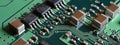 Closeup on electronic circuit board with components and semiconductors. long banner web image Royalty Free Stock Photo