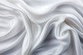 Closeup of elegant crumpled white silk fabric cloth background with luxurious texture Royalty Free Stock Photo