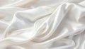 Closeup of elegant white silk fabric cloth with slight crumpling luxury background texture design