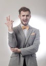 Closeup.emotional businessman on a gray background.