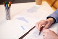 Closeup employee working at desk at company office