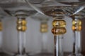 Closeup of empty glasses in a row on a flat surface Royalty Free Stock Photo