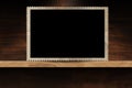 Empty Old Fashioned Photo Frame on a Wooden Shelf