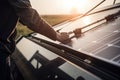 Closeup of engineer hand installing solar photovoltaic panel in solar farm, Closeup of man technician rearview installing solar Royalty Free Stock Photo