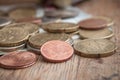 Euro coins and bank notes on wooden table background Royalty Free Stock Photo