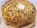 Closeup of the \'Everything Bagel\' with cream cheese Royalty Free Stock Photo