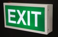 Exit sign, electrically operated glowing cabinet in a public place Royalty Free Stock Photo