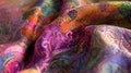 A closeup of the fabric in its colorchanging state with intricate patterns and designs emerging as the hues shift Royalty Free Stock Photo