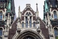 closeup facade with crucifix scene sculptures on catholic cathedral church in Lviv