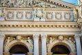 Closeup facade of Lviv opera and ballet theatre with different marble sculptures