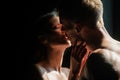 Closeup face of a beautiful young couple in love embracing, romance and and affection. Sensual couple in the tender Royalty Free Stock Photo