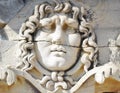 Closeup of a face carved on marble in classical style by ancient Greeks at the Temple of Apollo in Didyma. An impressive