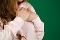 Closeup of faithful womans hands on chest near heart showing thankful or kindness. Concept of Health care, Charity