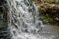 Closeup of falling and splashing streams of water, Ivande waterfall, Latvia Royalty Free Stock Photo