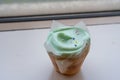 fancy cupcake, green frosting over vanilla cupcake Royalty Free Stock Photo