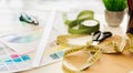 Closeup Of Fashion Designer Workplace With Measuring Tape And Color Samples Royalty Free Stock Photo