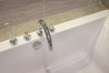 Closeup faucet on bathtub Royalty Free Stock Photo