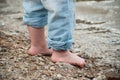 feet of child playing on the beach Royalty Free Stock Photo