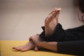 Closeup of feet and hands woman doing yoga Royalty Free Stock Photo